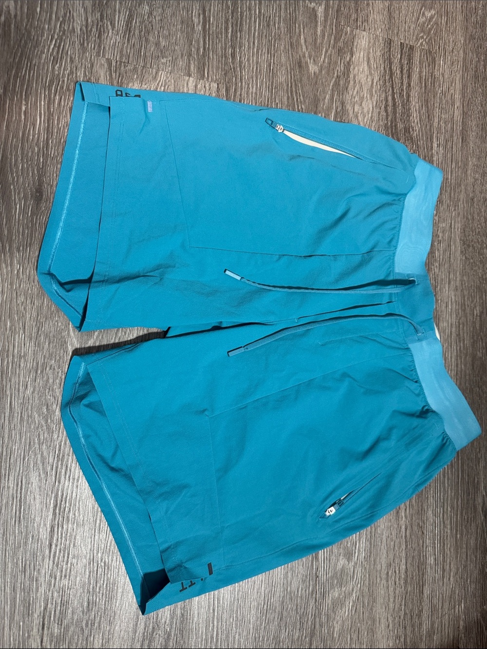 Lululemon License to Train Linerless Short. Inseam 7.5”. Teal blue